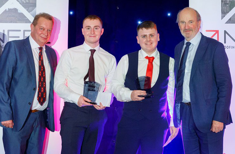 Aaron and Kyle receiving their award at the NFRC Scottish Roofing Contractor of the Year Awards